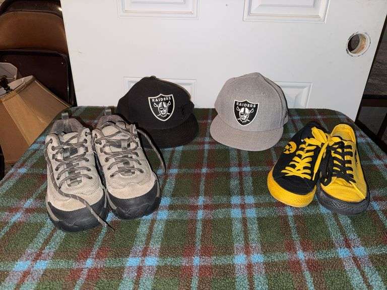 Two Raiders ball caps, Iowa Hawkeyes women’s size 7 skater shoes and womens Columbia Trailmeister size 6 hiking boots