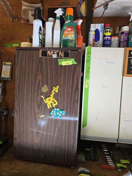 Dorm size refrig and garden chemicals image