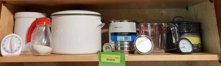 Stoneware utensil holder, enamel pots, timer, sifter, thermometer, etc image