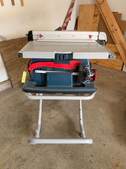 Bosch portable contractors saw, model GTA47W, folding stand,  NEAR NEW image