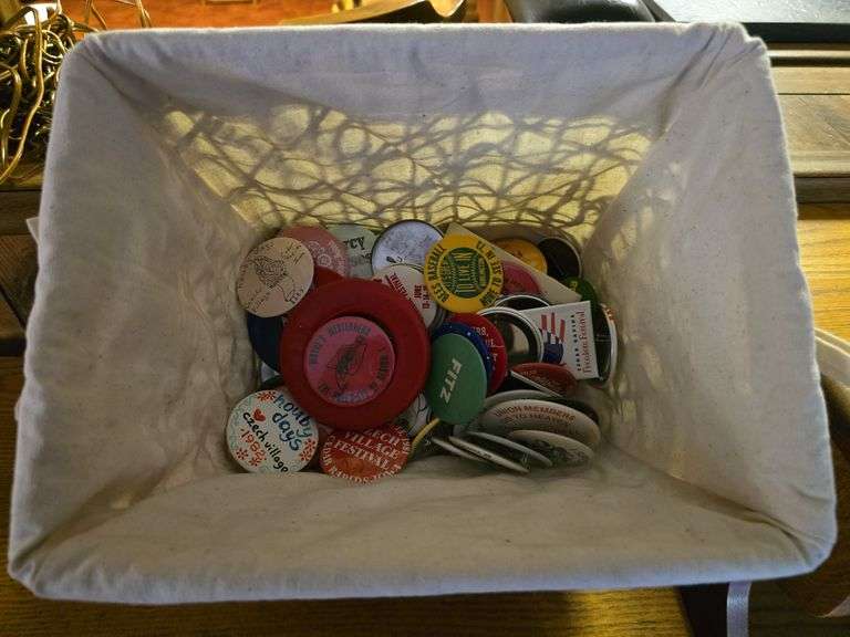 Basket of pin back buttons image
