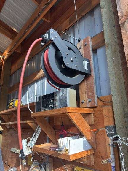 Central pneumatic retractable hose reel with 50 foot air hose - bring tools to remove image