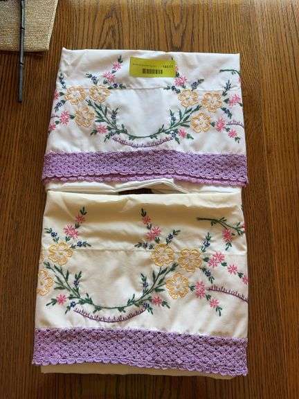 Two pillowcases with very fancy handiwork image