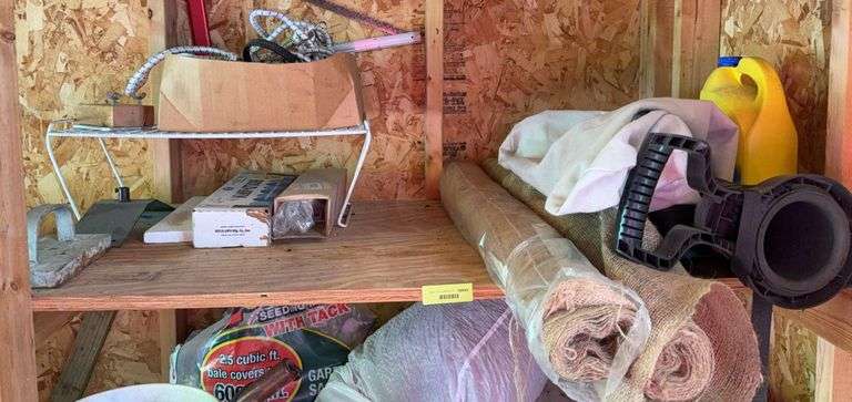 Heavy cord bungee cords, burlap, antifreeze and leaf blower bag image
