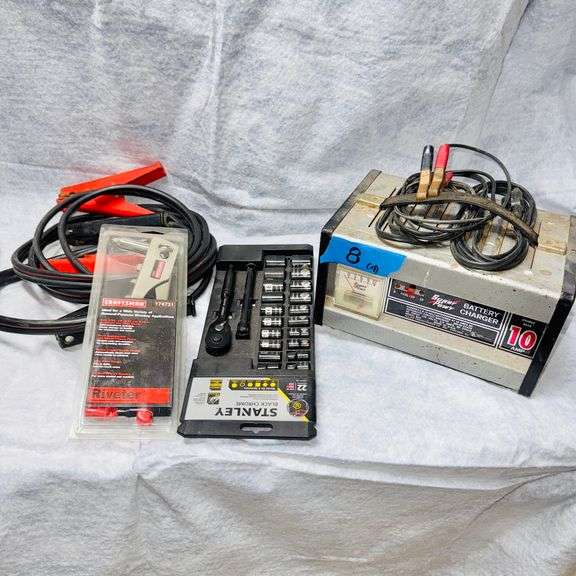 Auto lot with battery cables, battery charger, 10 amp, Stanley black chrome sockets, SAE & metric and a Craftsman pop riveter image