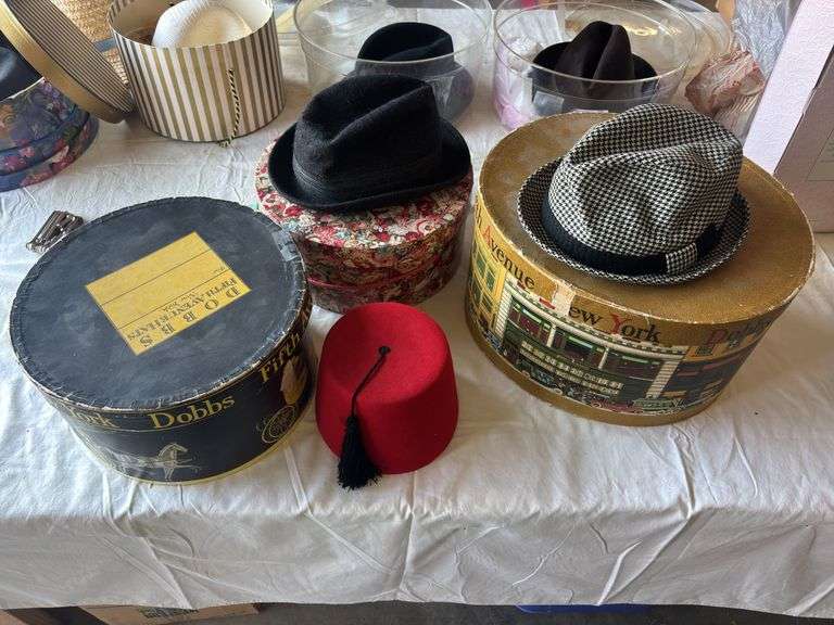 Three vintage hat boxes, Fez and two men’s vintage hats image