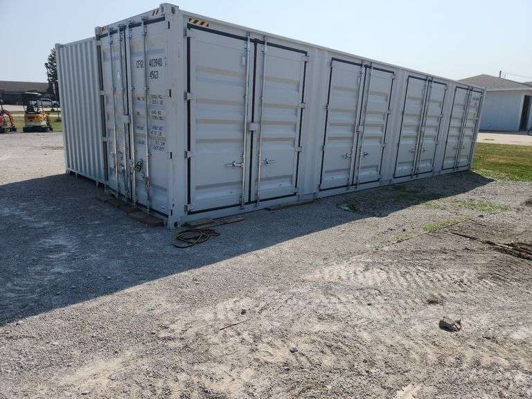 40' High Cube  Multi-Door Container, 4-side-door 40' HQ Container, Unused 40FT High Cube Four Multi doors Container. Details: Four Side Open Door, one end door, lock box, side forklift pockets.Measures 8FT Wide, 40FT Long, 113"Tall.  Side Door Opening Measurement: 92" W x 100" T x 88" Deep, Weight 9,500lbs. Buyer will have one week for removal, Cannot be picked up until after Thursday afternoon. If you need a moving quote please call the office and we can provide contacts for moving. SOLON image