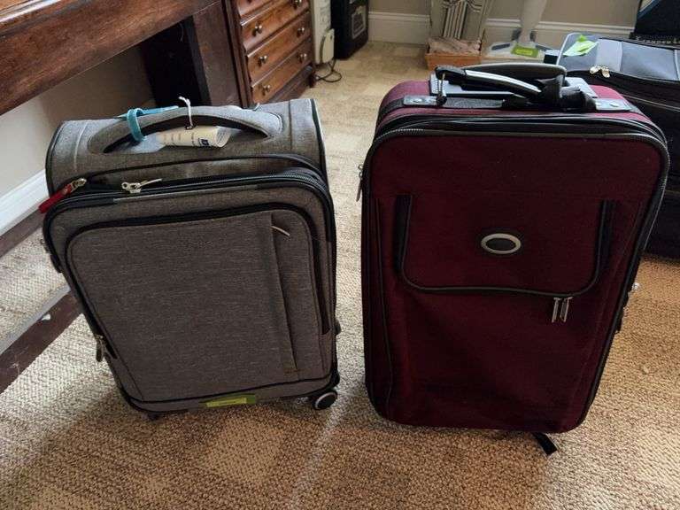 Two rolling suitcases image