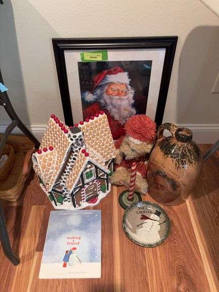 Christmas group includes two Susan Comish framed Santa prints, book, Boyd’s Santa bear, a gingerbread house, cookie plate and jug image