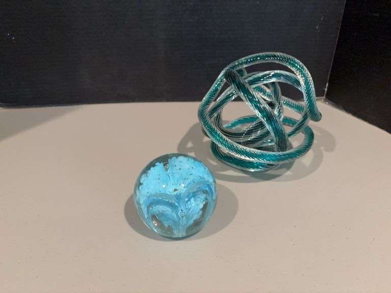 Twisted glass rope sculpture and clear glass paperweight w blue flower image
