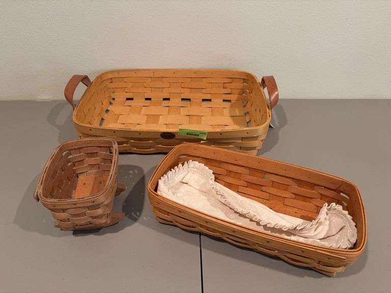 Two Longaberger baskets and Peterboro basket w leather handles image
