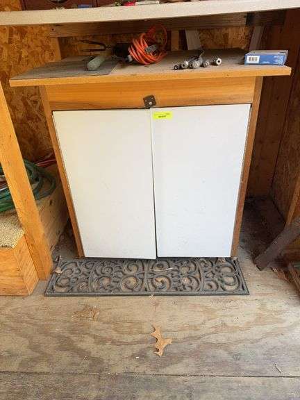 3 drawer double  door cabinet and contents image