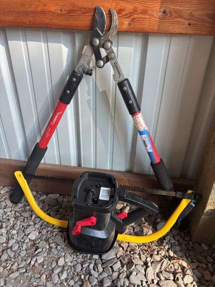 Tree trimmers, saw and seeder image