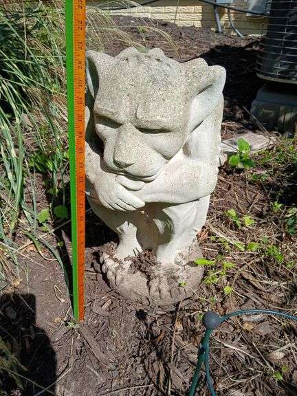 Resting cement gargoyle image