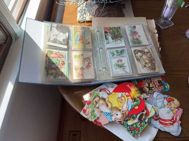 Scrapbooks w/ cards and postcards image