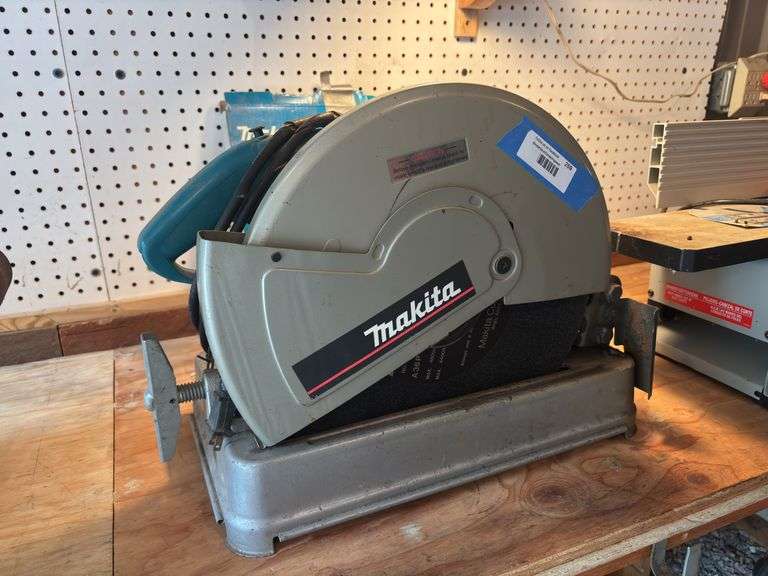 Makita 14 inch metal chopsaw with additional abrasive wheel new in package image