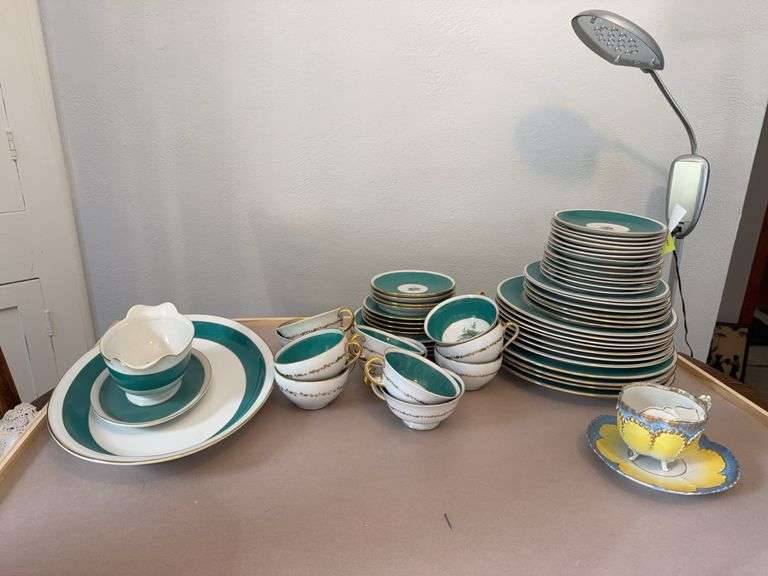 Several pieces Royal Bayreuth hand painted china and a right handed mustache cup with saucer This is not a complete set of china