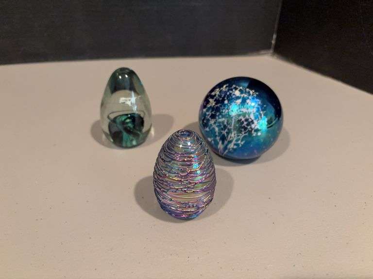 Three glass paperweights-one of the egg ones is marked Kerry Glass image