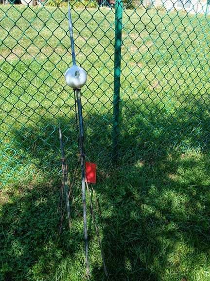 28” lightning rod and 30” lighting rod with milk glass ball, broken image