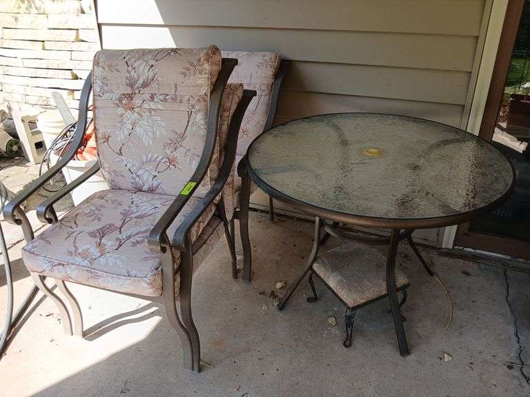 40” round glass topped patio table with 3 stationary chairs and two swivel image