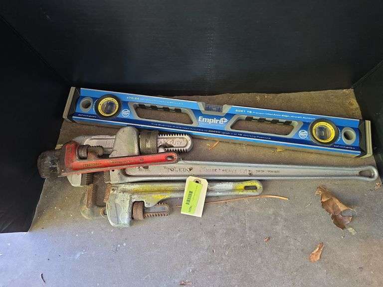 Empire level and 3 pipe wrenches image