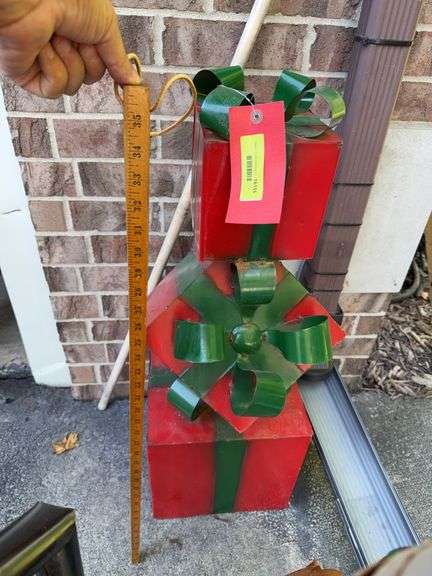 Approx 34” tall stacking metal presents image