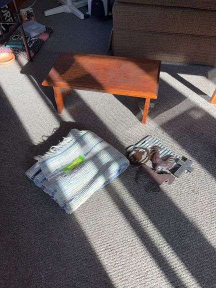 Small bench or stepstool and metal wall decor image
