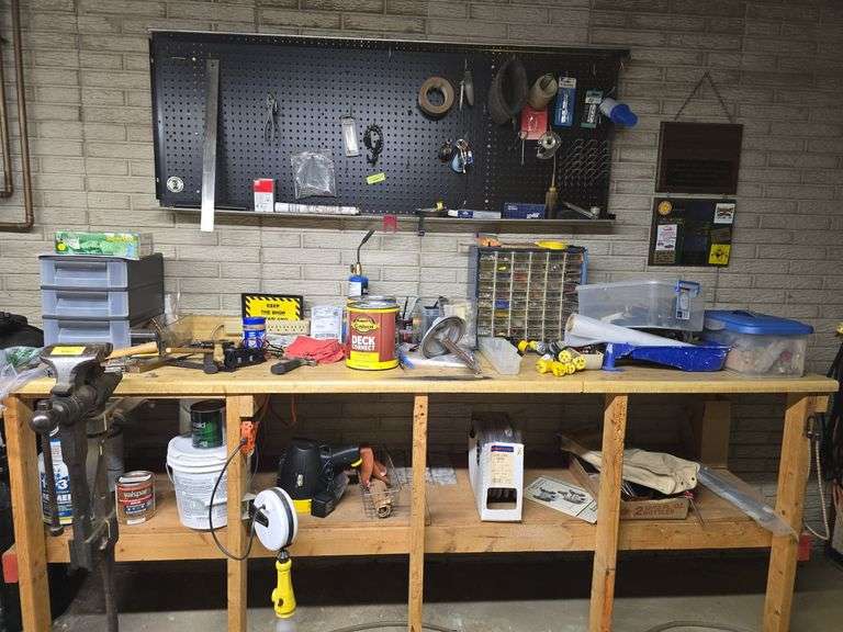 All on and under bench and pegboard includes wiring nuts, drawer assortment, clear tubing, spotlight, cord reel etc NO VISE!!! image