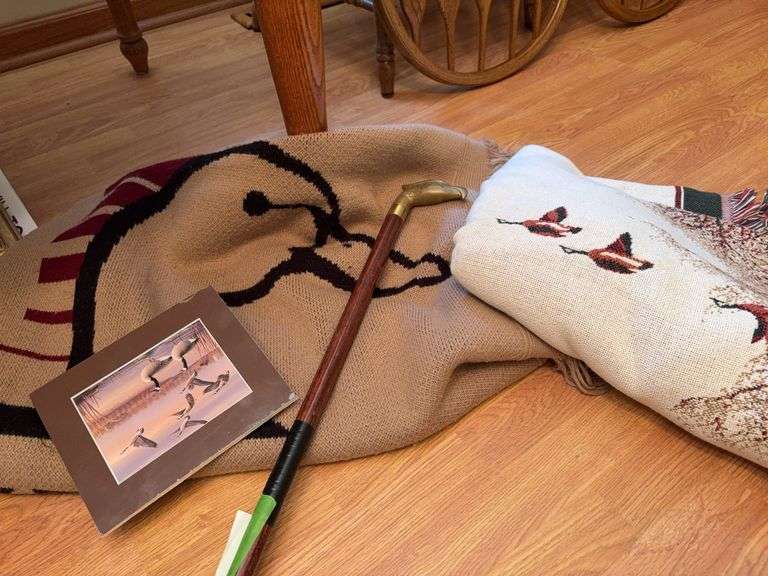 DU throws, walking stick, and Russ Duerksen print image