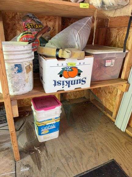Heavy tow strap, charcoal lighter, terra cotta flower pots, mulching straw etc... image