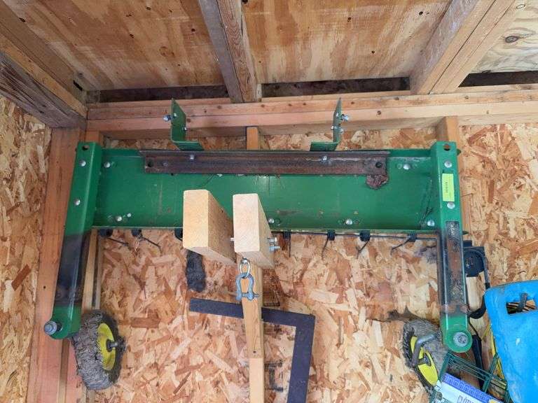 John Deere 40" dethatcher, has been adapted to fit front hitch image