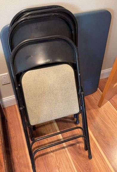 Folding table and four chairs image