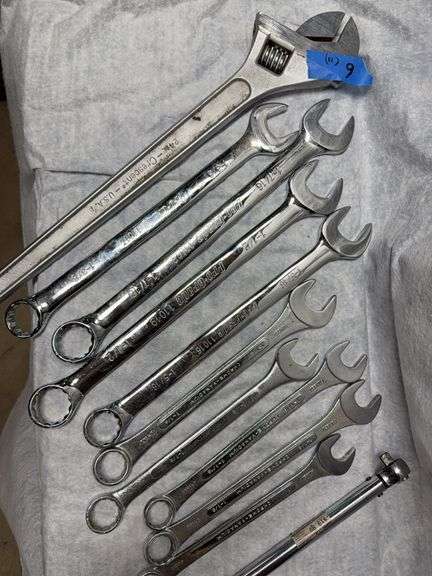 Lot with a 24-in crescent wrench, open and box ended wrenches 1 in through 1-1/2 in, torque wrench 20 to 150 ft lb image