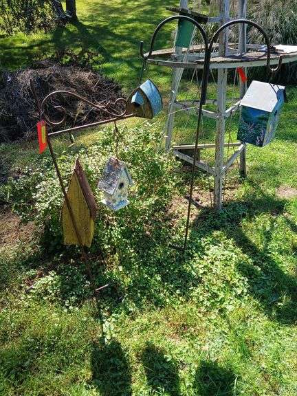 Shepherds hooks and birdhouses image
