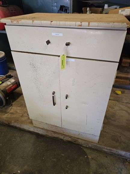 Small base cabinet with oil, garden fluids, elec supplies etc image