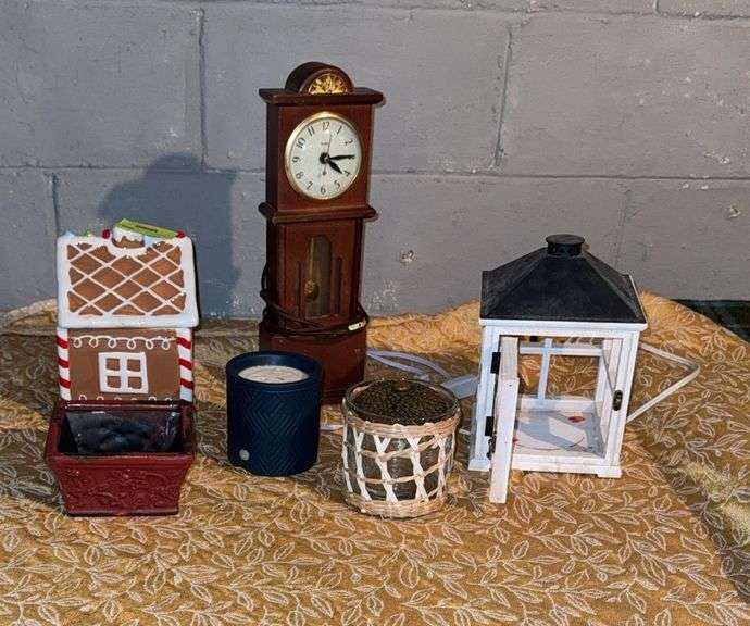 Gold tablecloth, wax warmer, candleholders, small cookie jar, United electric “grandfather” clock