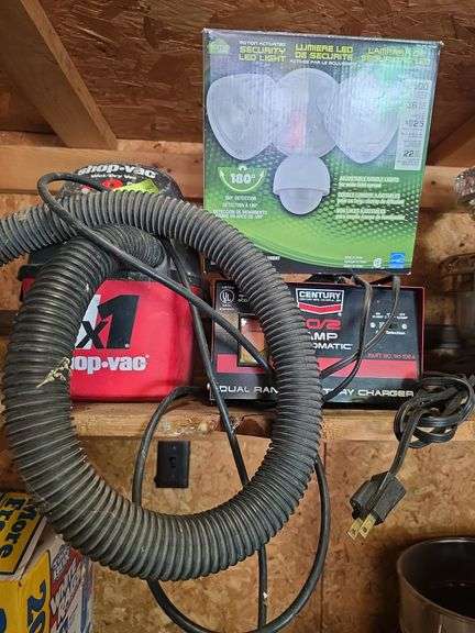 Battery charger and small shop vac image