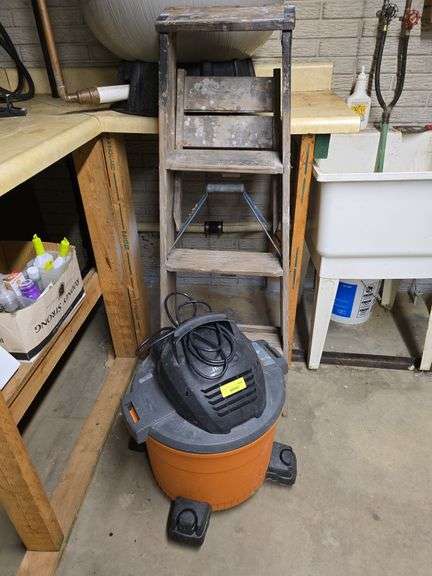 Rigid shop vac and 4' step ladder image