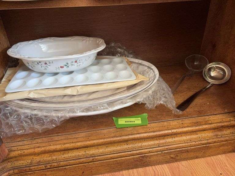 Holiday serving dishes and two ladles image