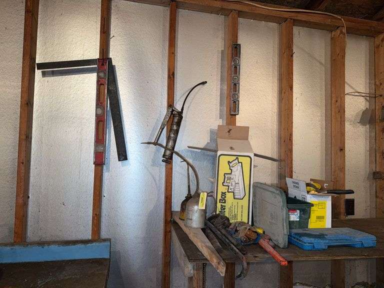 Pipe wrenches, sockets, levels, square, grease gun and more image
