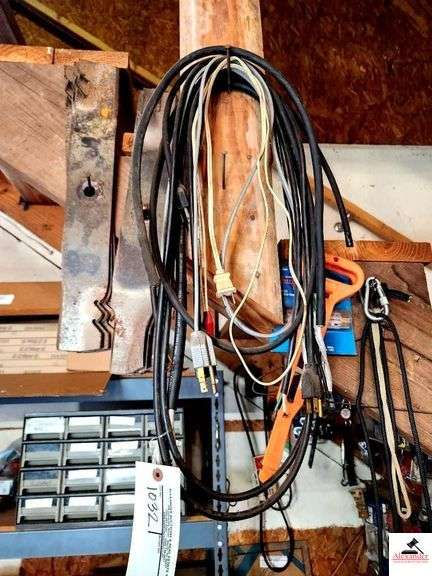 PAIR OF MOWER WHEELS-6 USED MOWER BLADES- EXTENSION CORD PLASTIC PIECES-2 CORDS WITH SNAPS-(SHOP) image
