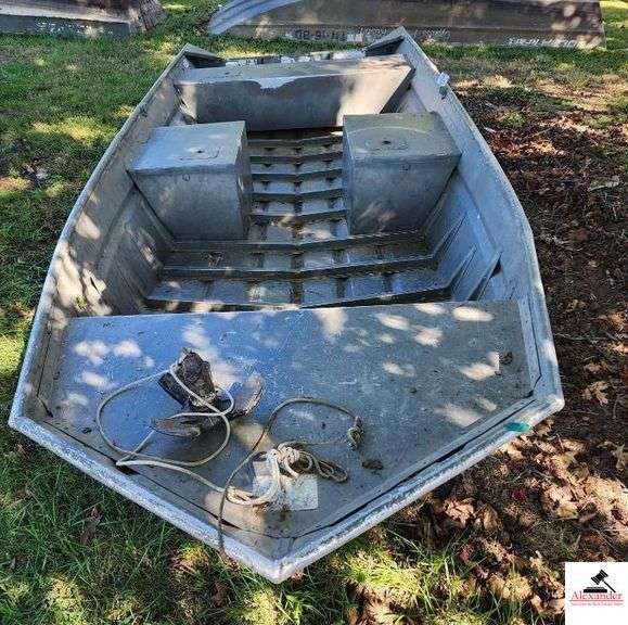 POLARCRAFT ALUMINUM BOAT- 16' LONG, 48" BOTTOM 21" SIDE, 14.5" DEPTH WHERE MOTOR IS - HAS ANCHOR - TN-16-BD - SEMI V HULL - - FEW DENTS - NO PLUG - NO SEAT - BEEN IN WATER, NEEDS CLEANING-(OUTSIDE)