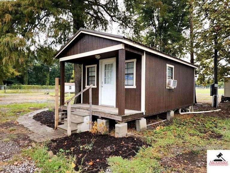 TINY HOUSE/CABIN 12' X 20' COMBO LIVING AND KITCHEN AREA WITH HAND WASH SINK, & BATH WITH WALK IN SHOWER - ELECTRIC BREAKER BOX - WINDOW AIR CONDITIONER - PARTIALLY FURNISHED - INCLUDES 4X12'' COVERED FRONT PORCH