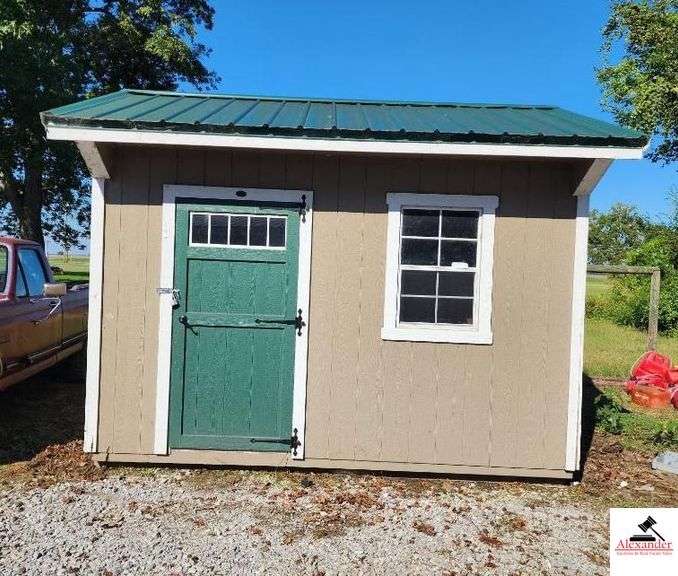 PORTABLE BUILDING WITH GREEN & WHITE TRIM 10'X12'-NW OF OFFICE
