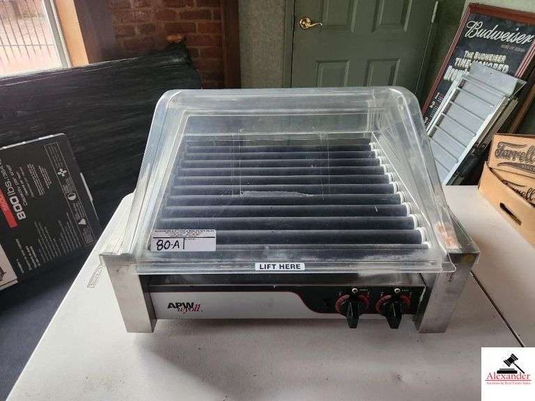 APW WYOTT STAINLESS HOT DOG MACHINE WITH PLASTIC TOP - MD. HRS-31 - 120 VOLTS image