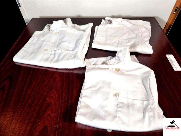 (3) WHITE CHEF'S JACKETS- (2) BLACK CHEF'S JACKETS- BLACK CHEF'S HAT image