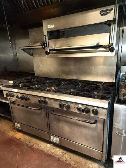 SOUTHBEND LARGE GAS COOK STOVE - 10 BURNERS DOUBLE OVEN - SUPERIOR OVEN GRILL ON TOP- INCLUDES THE STAINLESS STEEL BACK- 60 3/4" WIDE X 34 1/2" DEEP X 73" TALL image