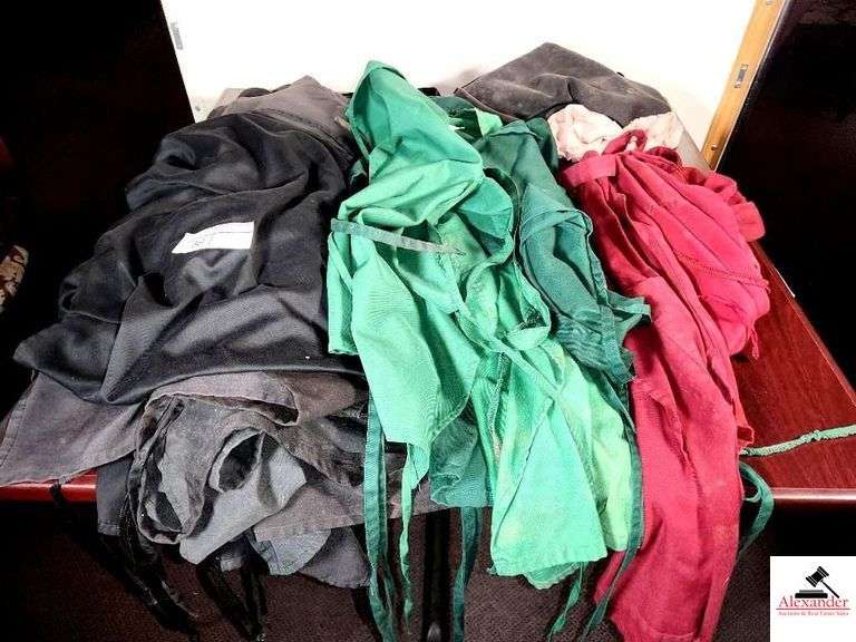 (26) BLACK COOKING APRONS- (15)BLACK- (7)GREEN- (3)BURGUNDY- (1)BLACK RUFFLE image