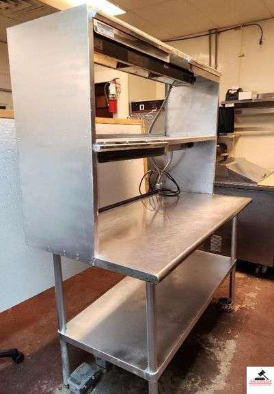 SURPERIOR STAINLESS WARMER ATTACHED TO TABLE HAS DOUBLE WARMER-30"X60"X36" TOTAL HEIGHT 73" TALL-110V image