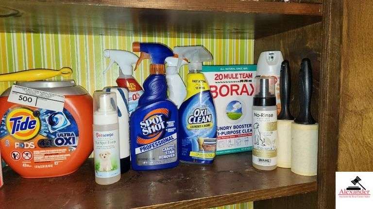 MISCELLANEOUS CLEANING SUPPLIES - TIDE PODS - LAMP OIL - CARPET CLEANER - MINERAL OIL - REGULAR STARCH - NOT ALL FULL - (UTILITY ROOM)